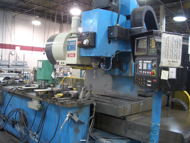 KOMO VMC-144, 3-AXIS, 10,000 RPM, 7.5 HP, CAT 40, FANUC CTRL, 144"-X, 20"-Y, 15"-Z, 1990