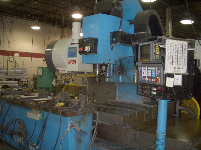 KOMO VMC-102, 3-AXIS, 10,000 RPM, 7.5 HP, CAT 40, FANUC CTRL, 102"-X, 20"-Y, 15"-Z, 1990