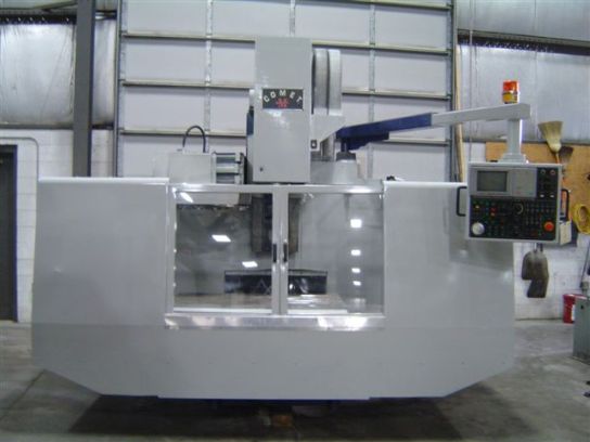 MIGHTY COMET VMC100G, 21 X 41 TRAVELS, 50 TAPER, 16 TOOLS ATC,  22HP, CHIP CONVEYOR, 1997