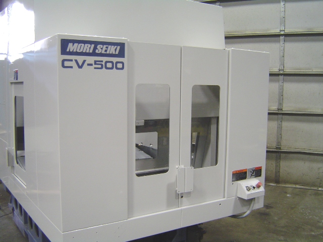  MORI SEIKI CV500A VERTICAL MACHINING CENTER, 20.08"X, Y, Z, 21.7" x 29.5" TWIN PALLETS, 25 ATC, 12,000 RPM, MSC-803 CNC, CAT 40, 1998