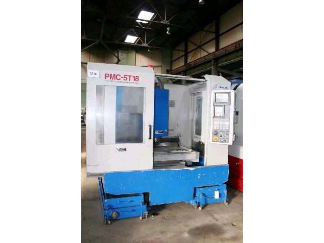 EXCEL PMC-5T18, Fanuc 21M CNC Control With Monitor. Handwheel Jog. Keyboard RS232 Port. 3.5" Floppy Drive. Rigid Tapping. 18-Position Automatic Tool Changer. Flood Coolant