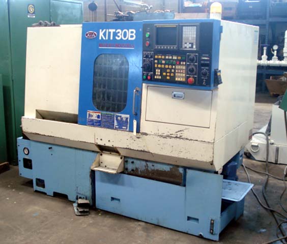 KIA KIT30B GANG TYPE 2-AXIS, 18.89" SWING, 6.5" HYDRAULIC CHUCK, 2001, 6000 RPM, FANUC OI
