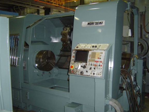 MORI SEIKI SL-6B, 35" SWING, 22" OVER CARRIAGE, FANUC 6TB, 12 STATION TURRET, 18" HYD CHUCK, 6" BAR CAP.