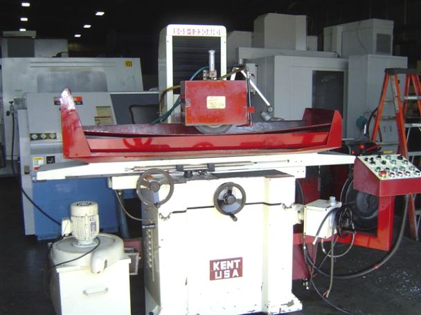 KENT SGS-1230AHD, dust collector/coolant system, 3 axis auto surface grinder, electro magnetic chuck, 12" x 30" Grinding capacity, 2000