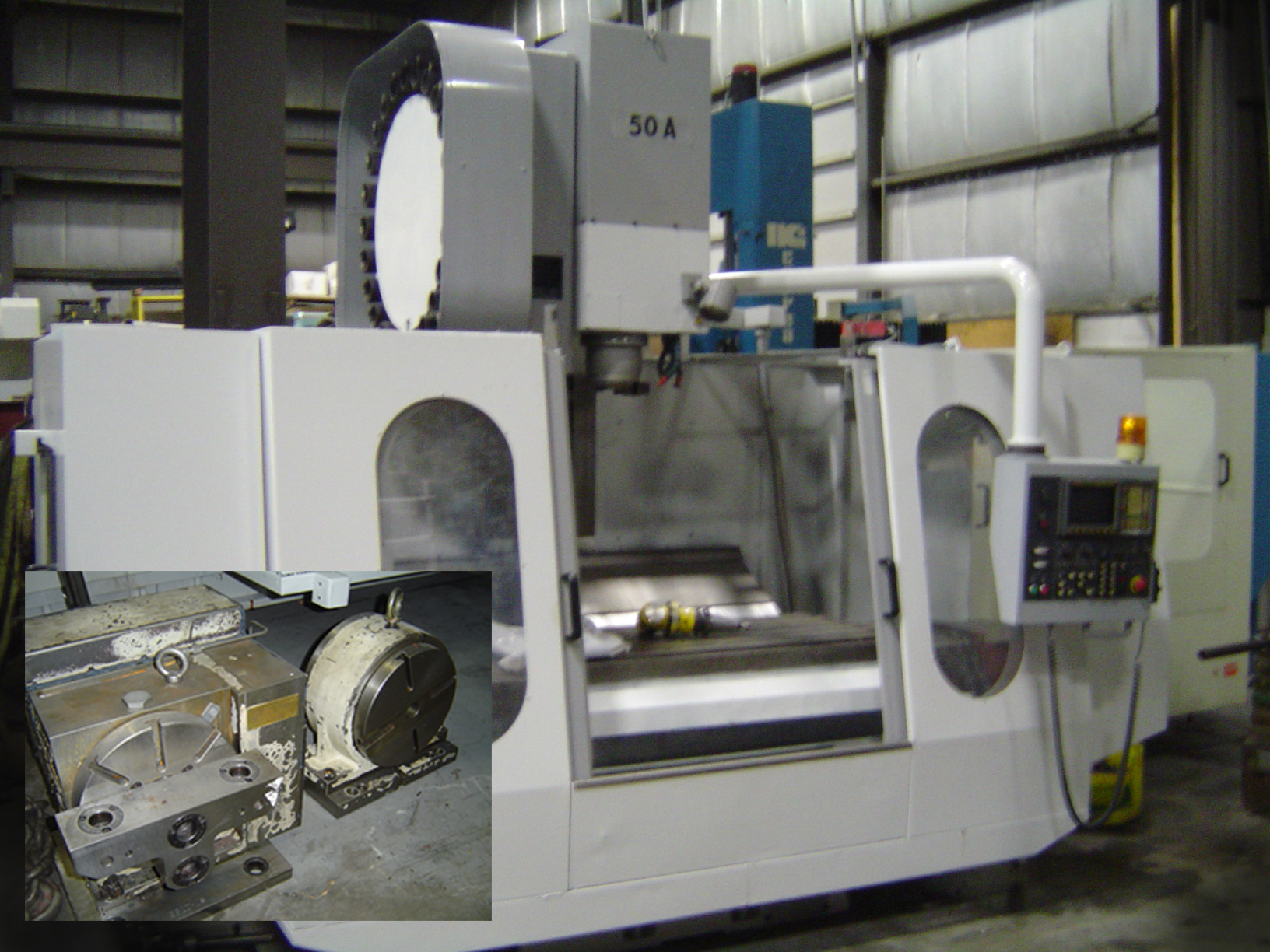 JOHNFORD VMC-1100H, 24 X 51 X 27 TRAVELS, 50 TAPER, 4500 RPM, ROTARY TABLE, RIGHT ANGLE HEAD, FANUC OM