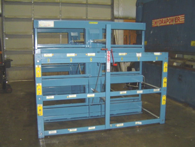 CRANK OUT RACK, 36" X 12' STEEL STORAGE RACK, OVERALL LENGTH 12', OVERALL WIDTH 78", 3 CRANK OUT SHELVES PER SIDE, 8400 LBS PER SHELF