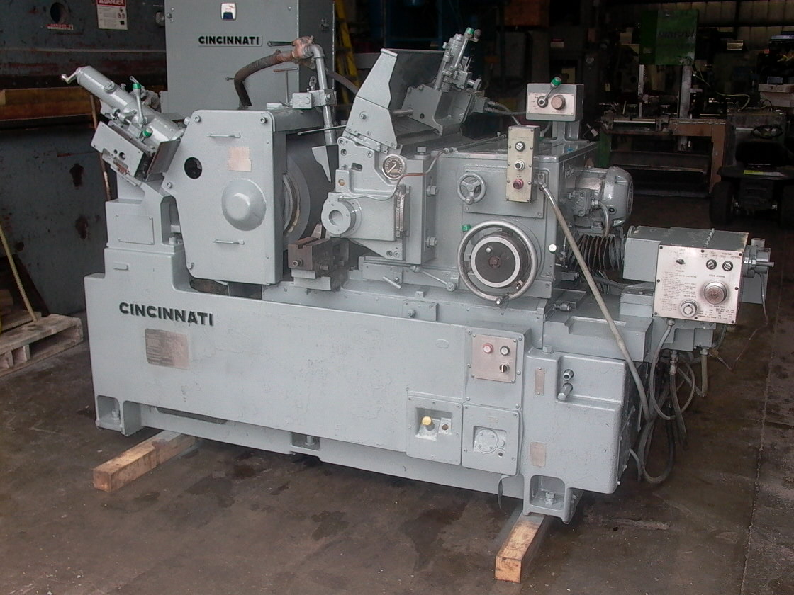 325-12 CINCINNATI,6" CAP., 24" DIA. X 12" WIDE WHEEL,AUTO INFEED,THRU FEED,DRESSING,TRUING