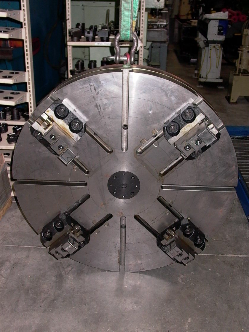49.5" UNUSED 4 JAW CHUCK, 4 MASTER JAWS WITH 2.5" STROKE, 7" THICK, OFF OF A TAKANG VTL