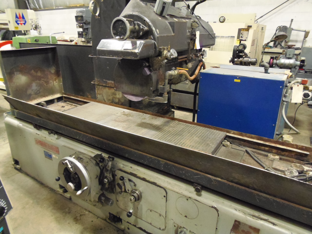 20" X 60" THOMPSON/NTC, MODEL FW50/150, 1985, INCREMENTAL DOWN, 20" X 60" MAG CHUCK, COOLANT/FILTRATION SYSTEM, 3" X 12" WHEEL