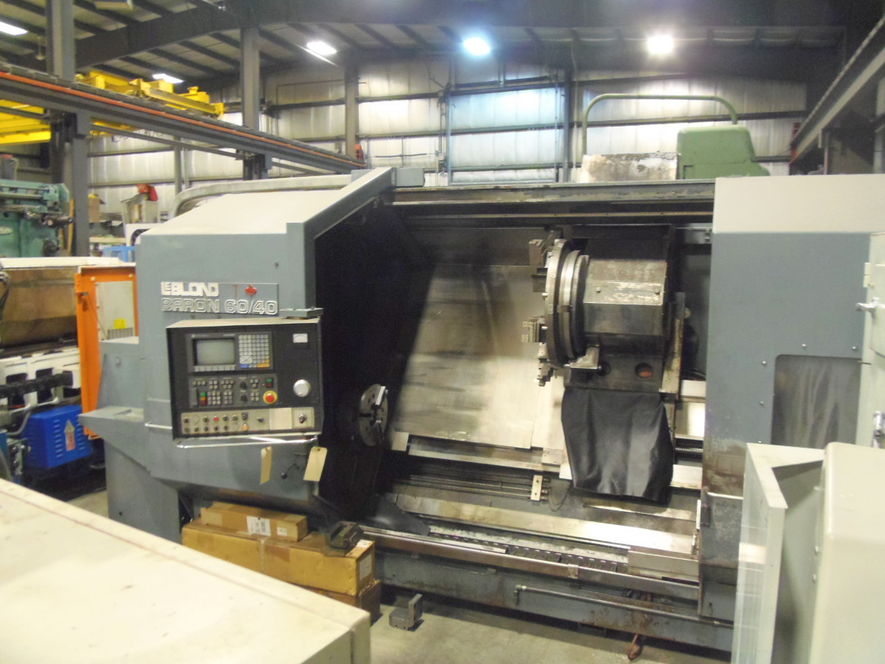 27 X 72 LEBLOND BARRON 60/40, RUNS GREAT, 15" CHUCK, 4.62 HOLE THRU SPINDLE, AB SERIES 9 CONTROL, CHIP CONVEYOR