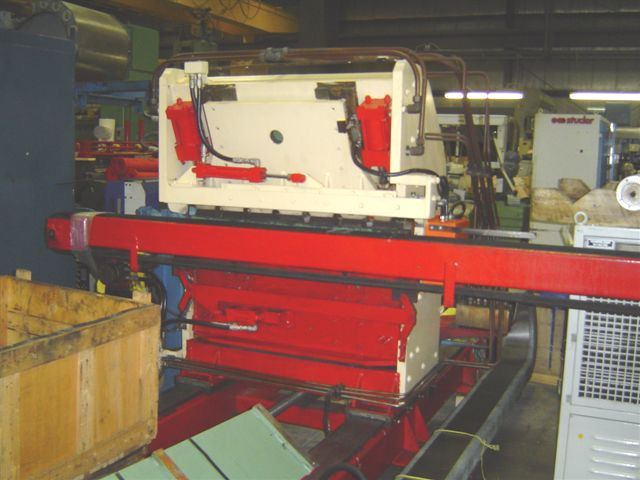 END BENDER UNIT FOR A ROLL FORMER