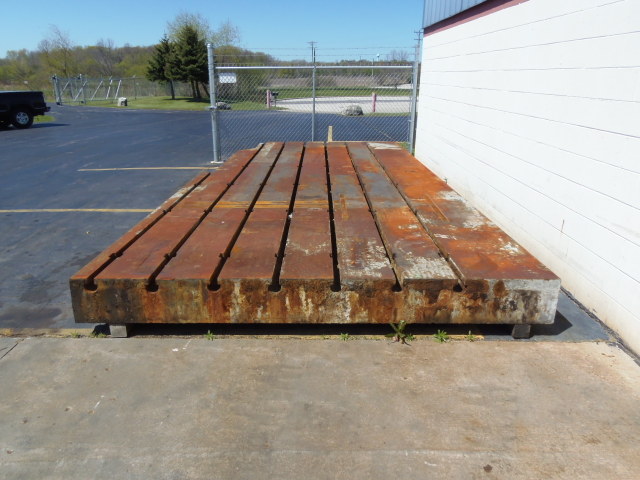 8' X 21' T SLOTTED FLOOR PLATE, OVERALL WIDTH 10', CORNER DAMAGED, 12" THICK, 7 T-SLOTS