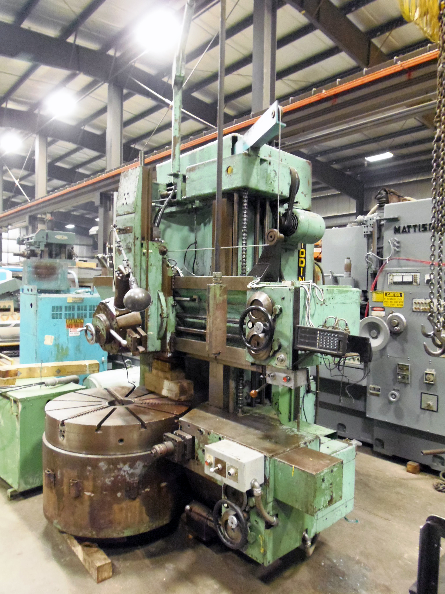 42" GIDDING & LEWIS VTL, 3 JAW CHUCK, 3 AXIS SONY READOUTS, TURRET/SIDEHEAD, 320 RPM, 37" VERT.