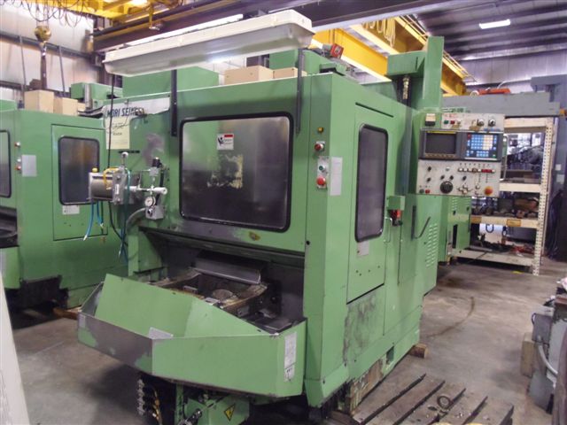 MORI SEIKI M 300 A1, DUAL 12.4" PALLET, BT 40, 15.7"X, 11.8"Y, 19.5"Z, MF-M4 (FANUC OMC) CONTROL, 20 TOOLS, 1991