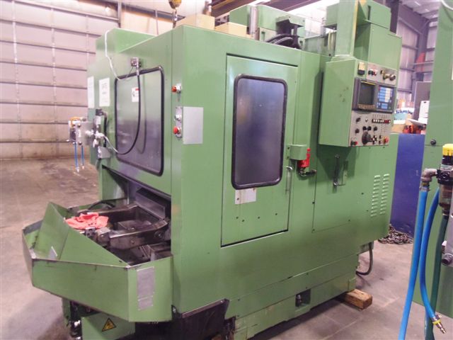 MORI SEIKI M 300 A1, DUAL 12.4" PALLET, BT 40, 15.7"X, 11.8"Y, 19.5"Z, MF-M4 (FANUC OMC) CONTROL, 20 TOOLS, 1991