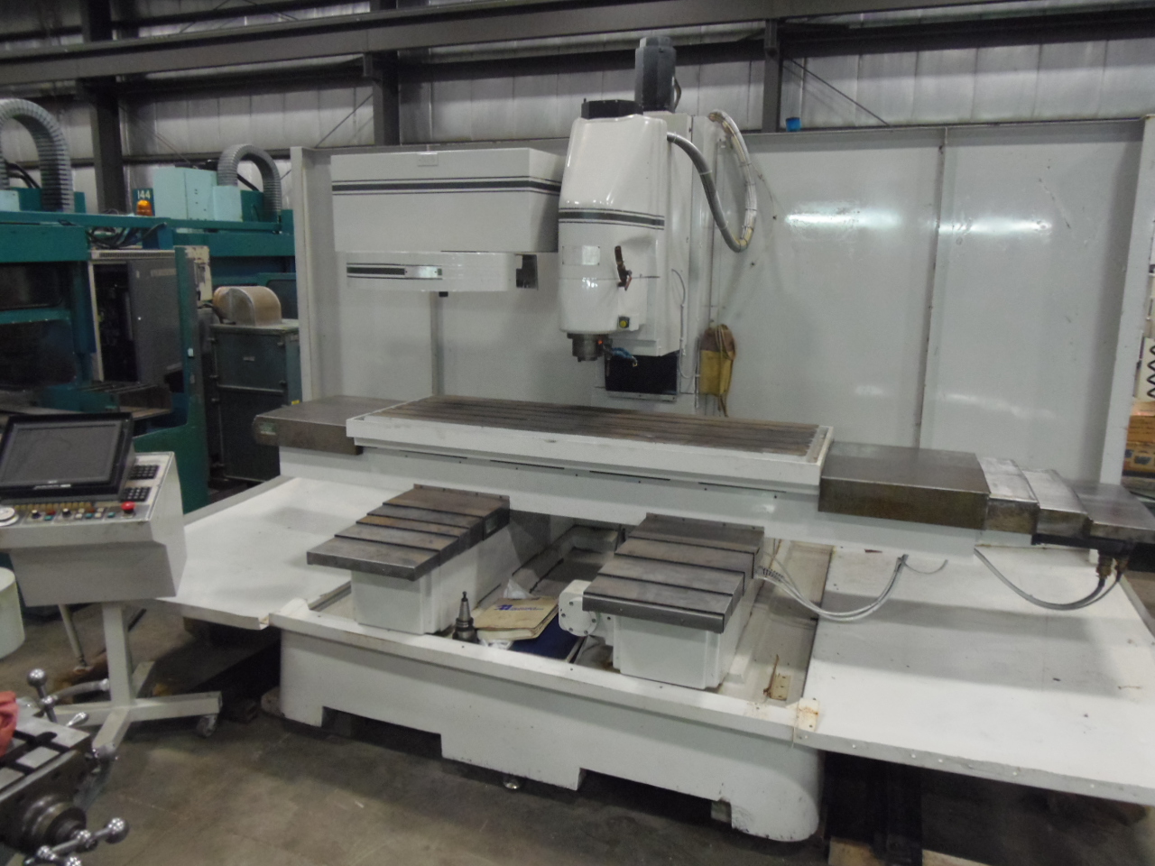 MILLTRONICS VMD30A, 70" X 30" X 26.5", 24 X 70 TABLE, 20 ATC, 40 TAPER, CENTURION 5 CNC CONTROL, 1996