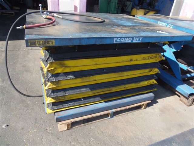 ECONO LIFT AIR OPERATED LIFTING TABLE, 50" X 60", 6000LB. CAP, SAFETY SKIRT, 36" LIFT HEIGHT, FORK POCKETS, 2005