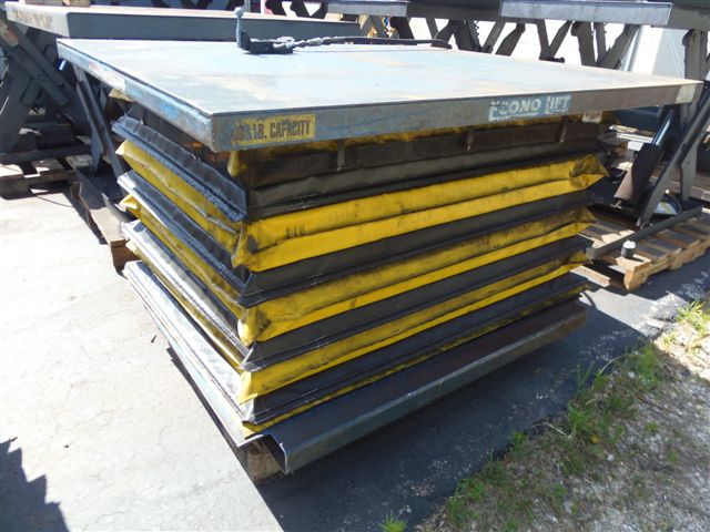 ECONO LIFT AIR OPERATED LIFTING TABLE, 50" X 60", 6000LB. CAP, SAFETY SKIRT, 36" LIFT HEIGHT, FORK POCKETS, 2005
