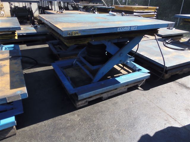 ECONO LIFT AIR OPERATED LIFTING TABLE, 50" X 60", 6000LB. CAP, SAFETY SKIRT, 36" LIFT HEIGHT, FORK POCKETS, 2005