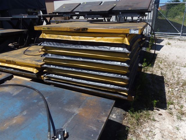 ECONO LIFT AIR OPERATED LIFTING TABLE, 50" X 60", 6000LB. CAP, SAFETY SKIRT, 36" LIFT HEIGHT, FORK POCKETS, 2005, 14 IN STOCK