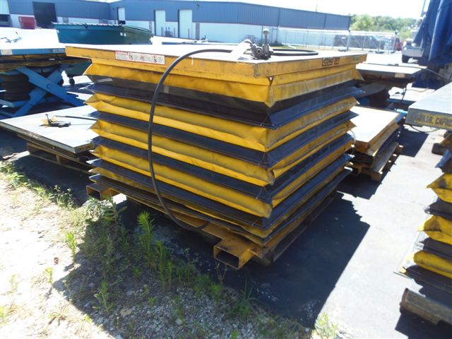 ECONO LIFT AIR OPERATED LIFTING TABLE, 50" X 60", 6000LB. CAP, SAFETY SKIRT, 36" LIFT HEIGHT, FORK POCKETS, 2005