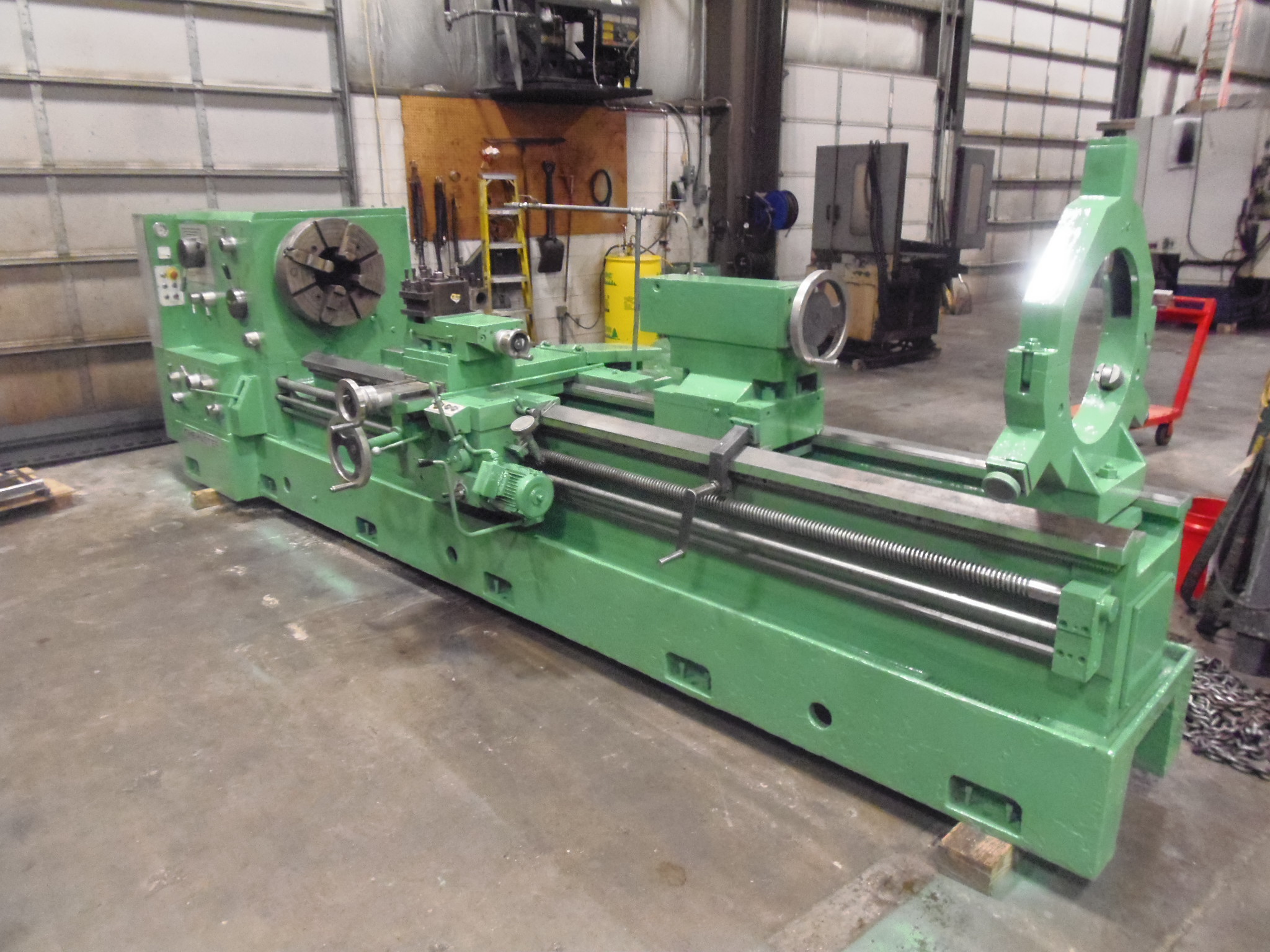 32" X 120" TIMEMASTER/GURUTZPE, 10" HOLE, F & R 10" HOLE CHUCKS, 500 RPM, RAPIDS, 32" GAP, 19" OVER CROSS SLIDE, AUTO THREADING,1981