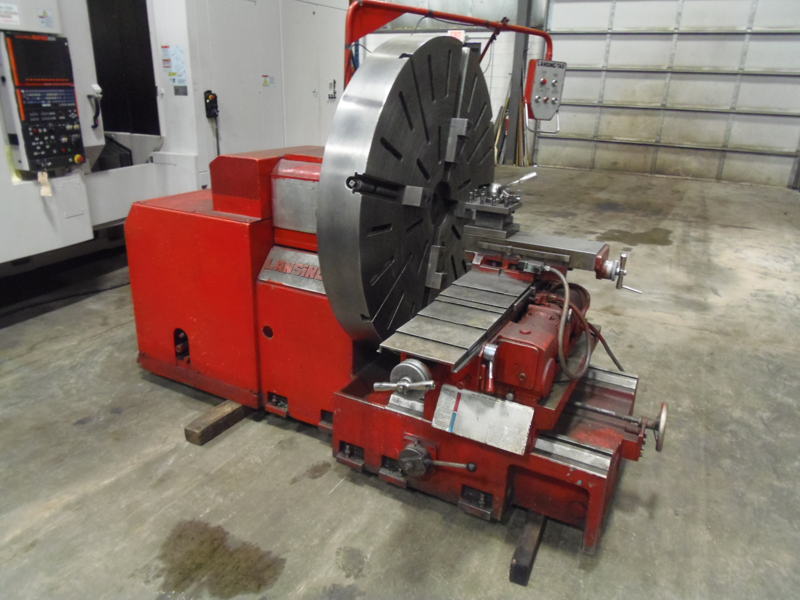 53" LANSING FACING LATHE, TAD-F650, 51" 4-JAW CHUCK, 8-200 RPM