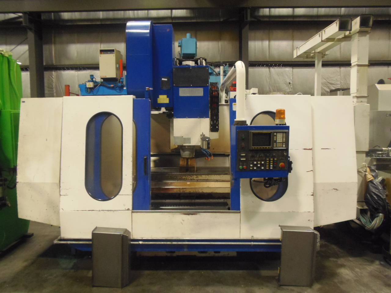JOHNFORD VMC 50B, MODEL1100H, 50 TAPER, 24" X 50" TRAVELS, 27" IN Z, FANUC OM, 1998