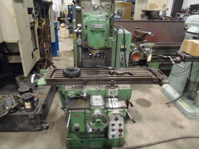 MH-2P OKK, 11 X 51 TABLE, 10 X 28 TRAVELS, 50 TAPER, 60 - 1800 RPM, POWER RAPIDS AND FEEDS, HORIZ WITH UNIVERSAL VERT. HEAD, AUTO CYCLES, BED TYPE