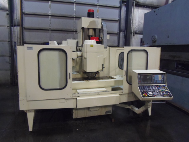 TONGIL TNV-80F39, 29.5"X, 17.75"Y, 19.7Z, 4500 RPM, BT-40, FULL ENCLOSURE, FANUC OM, 1990