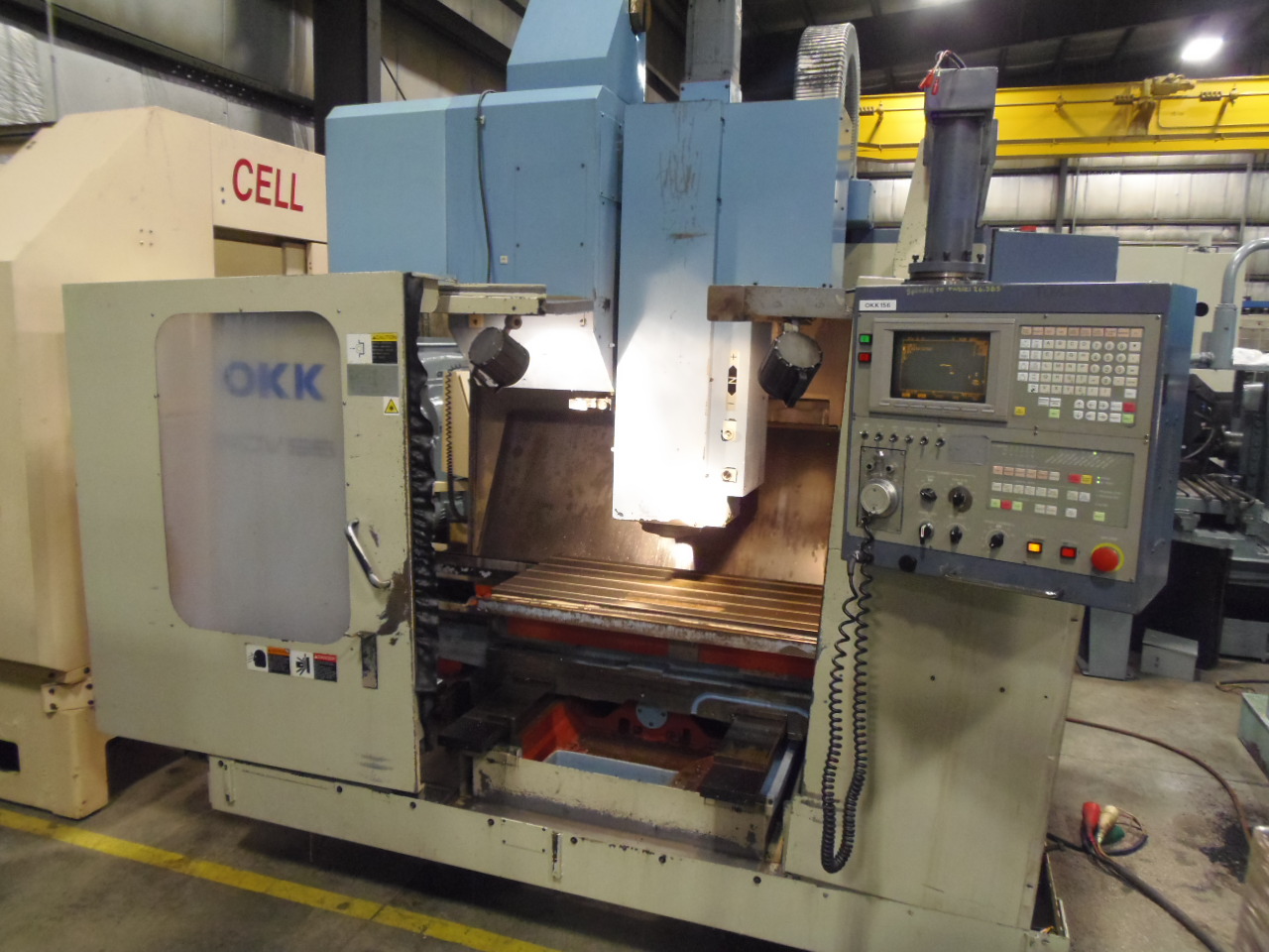 OKK PCV-55, OKK NEOMATIC CONTROL, 40 X 22 X 21 TRAVELS, 13,000 RPM, 50 TAPER, 1998.