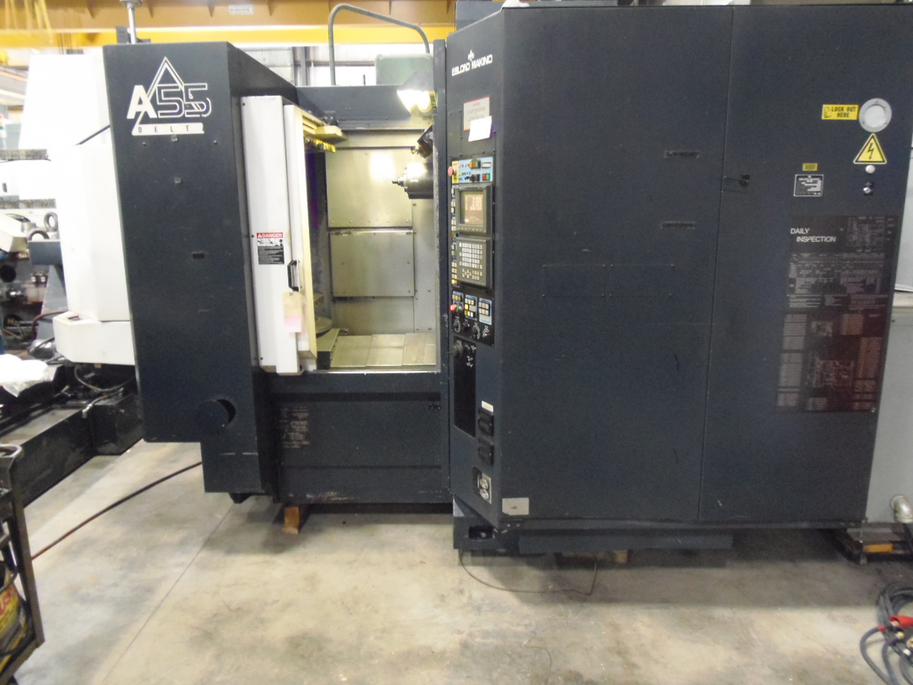 MAKINO A-55 DELTA, 15.75" PALLETS, 40 TOOLS, 14,000 RPM, FANUC 16M CONTROL, THRU SPINDLE COOLANT, CHIP CONVEYOR,  1 DEGREE, 1999