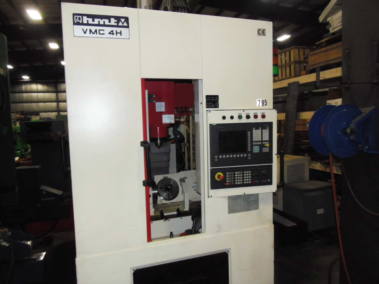 HMT 5 AXIS VERTICAL MACHINING CENTER, MODEL 4H, 15" X 0 11" - Y, 11" -Z, 8 ATC, 2004, NEVER USED