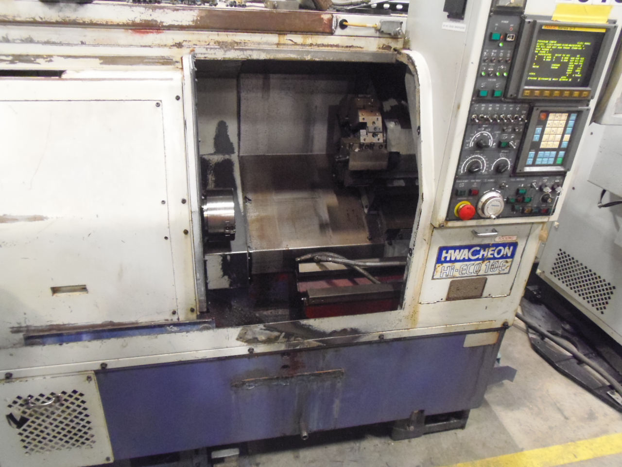 HWACHEON HIECO 10E, 6" HYD. CHUCK, FANUC 0-T, CHIP CONVEYOR, 1999