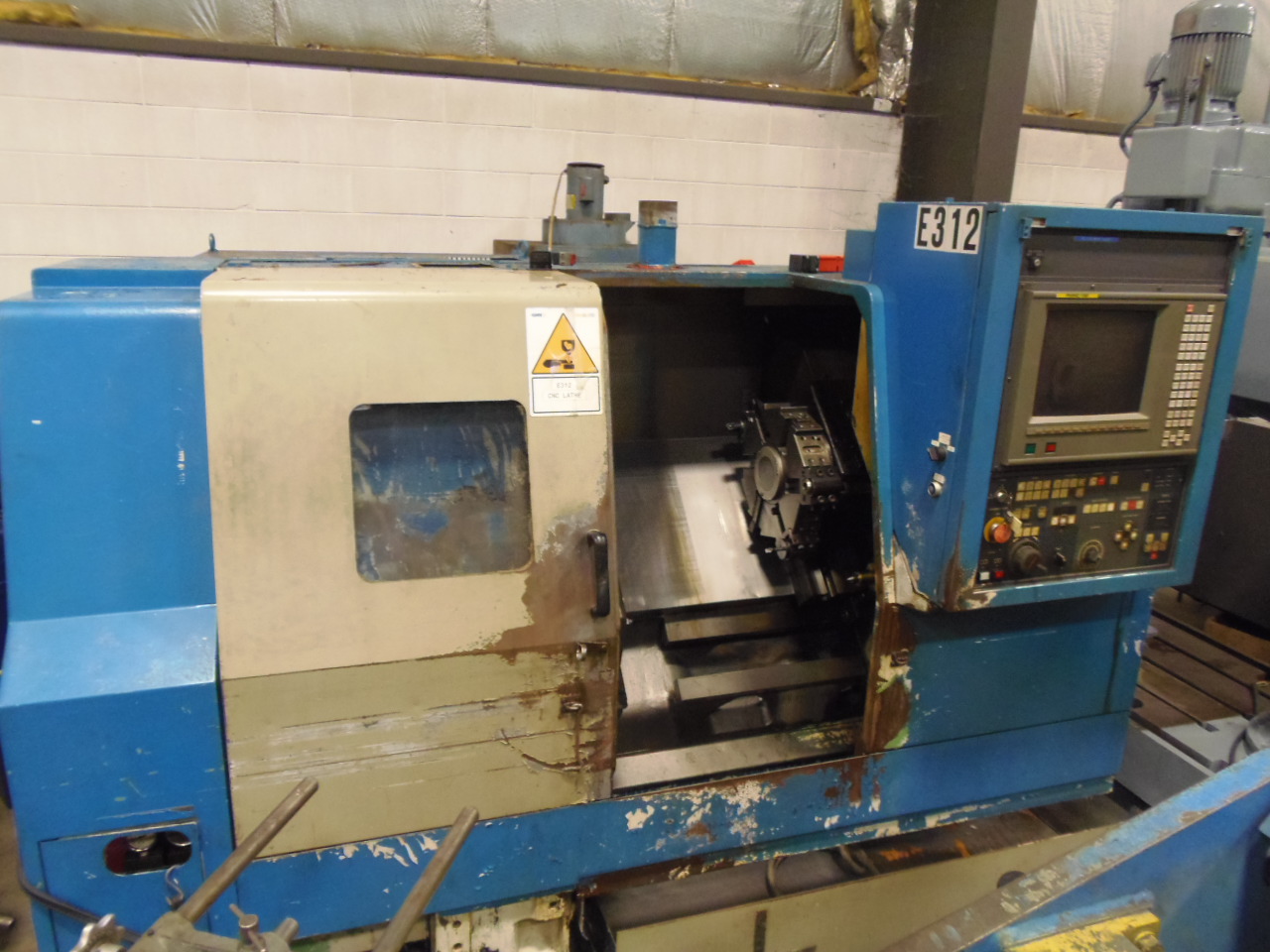 MORI SEIKI SL-15 CNC LATHE, 17.7" SWING, 23.4 CENTER DISTANCE, 6.5" kitagawa, 60-6000 RPM, MORIC-T6F(FANUC 16T) CONTROL, 1993
