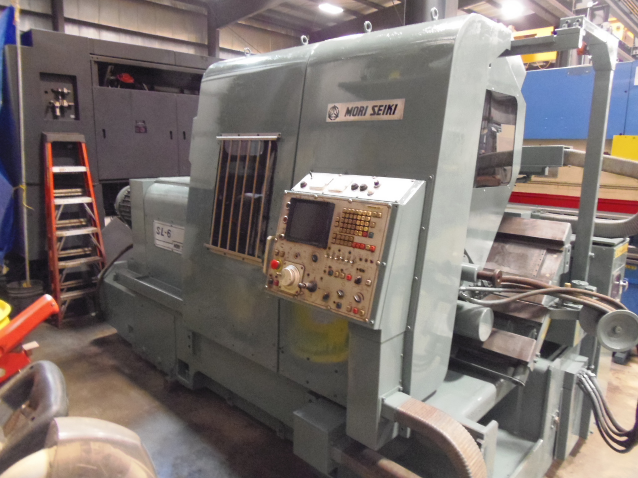 MORI SEIKI SL-6B, 35" SWING, 22" OVER CARRIAGE, FANUC 6T, 12 STATION TURRET, 18" 3-JAW CHUCK, 5" THRU CHUCK, 6.3" SPINDLE BORE, 1982