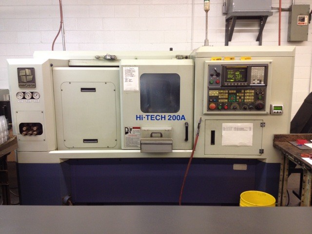 HWACHEON HI-TECH 200A, 2003, W/ LIVE TOOLING, 5000 RPM, 12 TOOLS, 19.7" SWING X 15.7" CTRS, TAILSTOCK, FANUC 0i-TB CONTROL, PARTS CATCHER