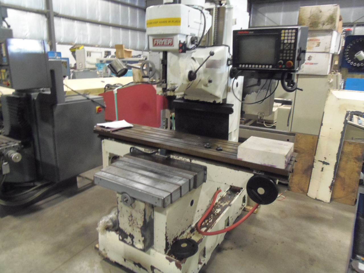 FRYER MB-15 CNC BED TYPE VERT MILL, 7.5 HP, X = 50, Y = 25, Z = 24, 16" x  67" TABLE, ANILAM 1100M CONTROL, 1996