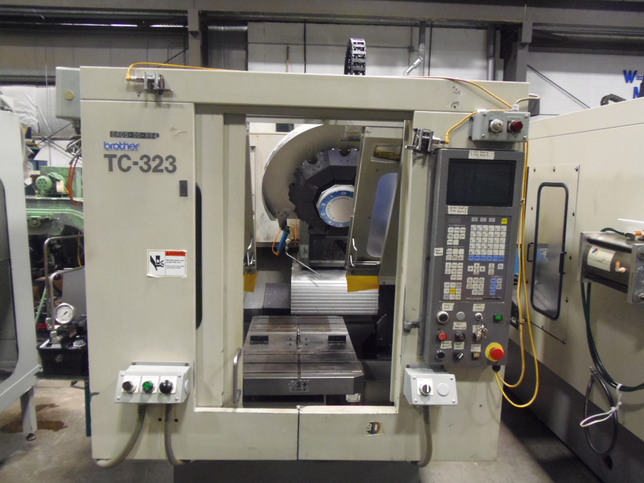 BROTHERS TC-323, 10 ATC, PALLET SHUTTLE, CONVERSATIONAL CONTROL, COOLANT