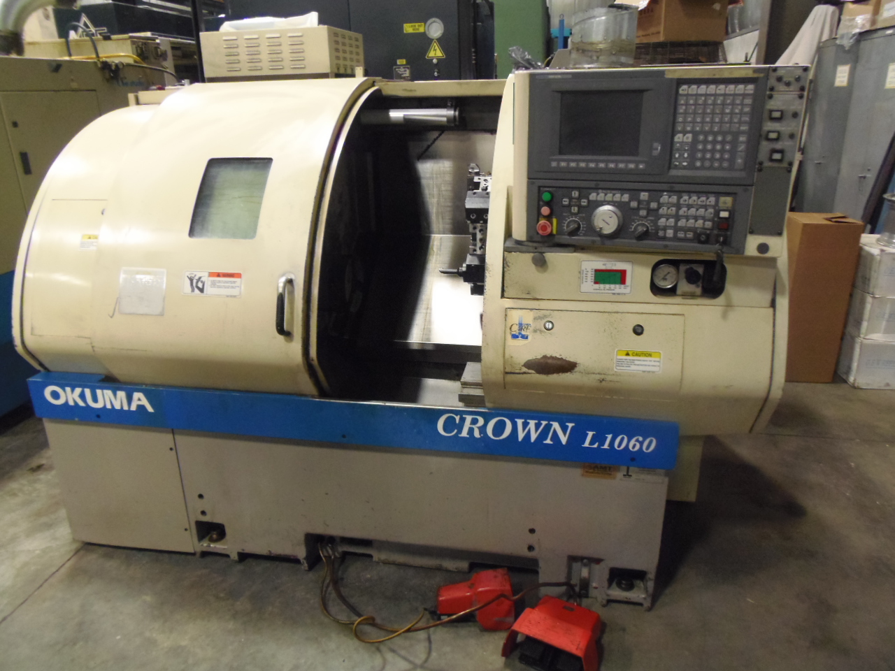 OKUMA CROWN L-1060 (762-SSB), 20" CTRS, PROGRAMMABLE TAILSTOCK, 8" HYD CHUCK, OSP-U10L CONTROL, ONLY 3886 CUTTING HOURS, NEW 2000