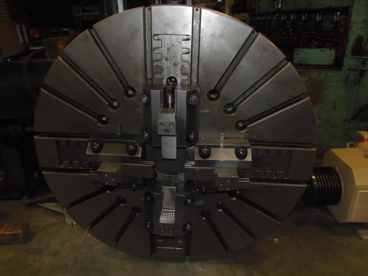 49" 4-JAW CHUCK, MANUAL, GOOD CONDITION, 8" THICK