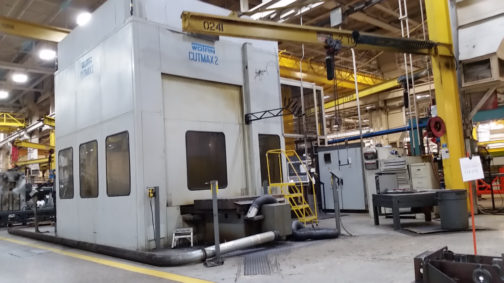 4.75" WOTAN CUTMAX II, DUAL 55 X 63 PALLETS, 71 LONG. X 67 VERT. X 53 IN/OUT X 24 QUILL, 240 ATC, THRU SPINDLE COOLANT, 4 TH AXIS, 3000 RPM, 41 HP, SIEMENS 840C CONTROL, 1996